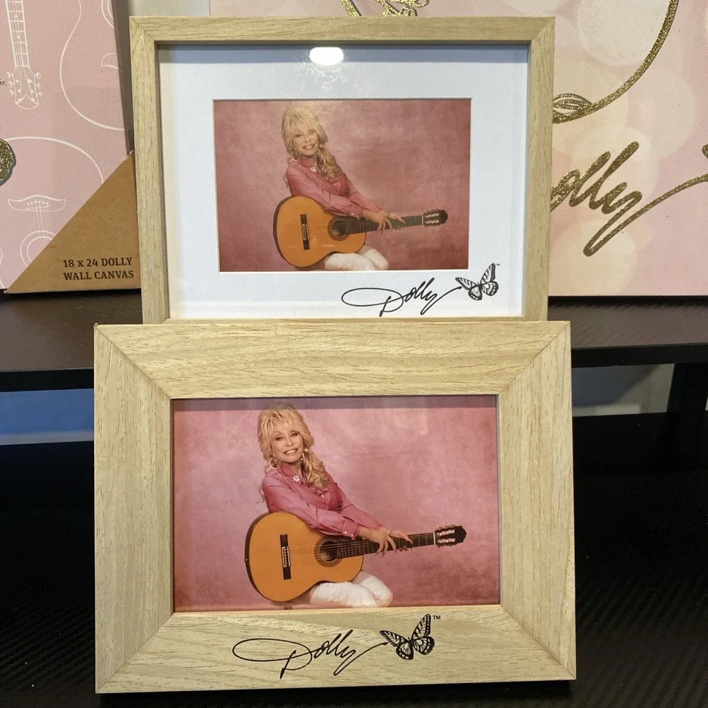 New 2  Dolly Parton framed pictures